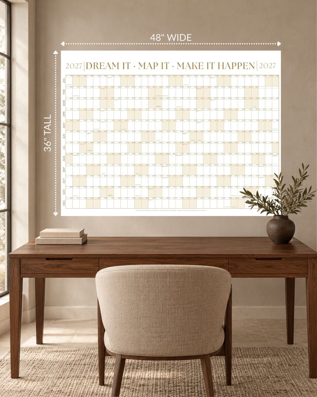 2027 Signature Wall Calendar Kit in Sandstone Gold, 48 x 36 inches, above a desk